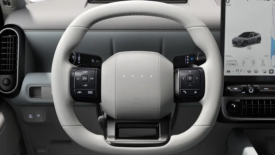 Vista aproximada do volante e ecrã do Hyundai IONIQ 3